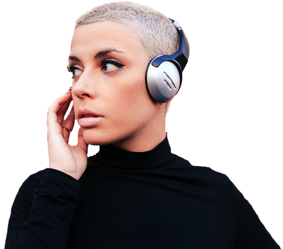 woman listening to a podcast in the office of a podcast production company